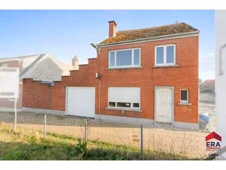 maison à rénover avec garage  jardin et potentiel de projet