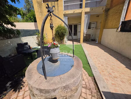 maison divisée en 3 appartements avec jardin  terrasse et garage