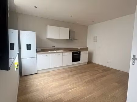 ? appartement 2-pièces lumineux avec balcon et jardinet  au calme  proche du centre-ville 