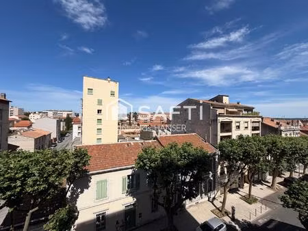 appartement traversant est/ouest plein centre ville d'alès