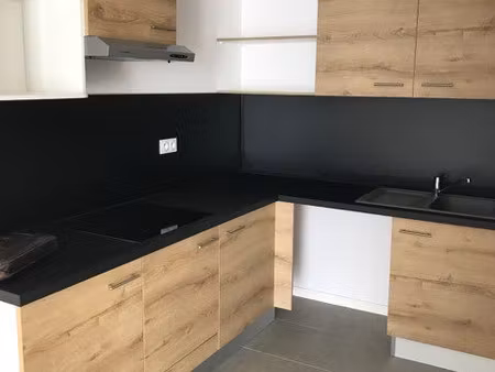t3 63m² avec balcon et 2 places de parking vdo