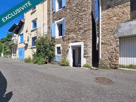 une authentique maison en pierre avec vue sur la rivière  au cœur d’un hameau préservé des