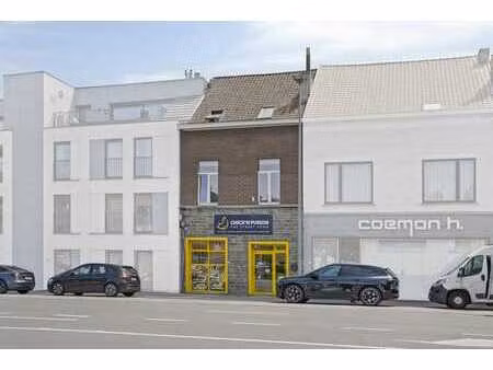 propriété commerciale avec maison à vendre à courtrai