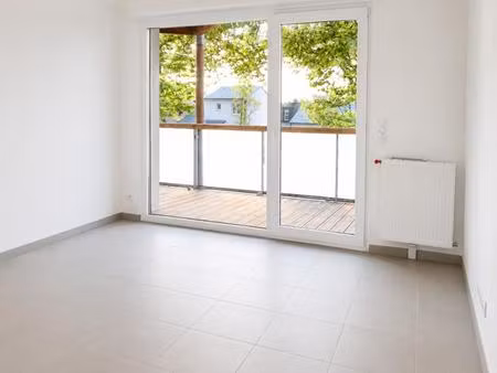 t2 avec balcon et parking à colombelles