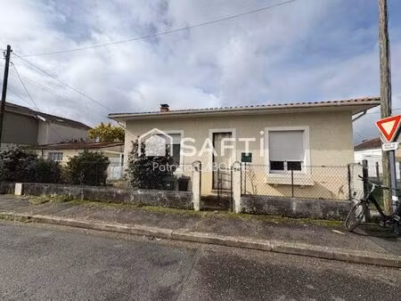 parcelle 300 m2  maison de plain pied de 70 m2 avec grand garage à rénover