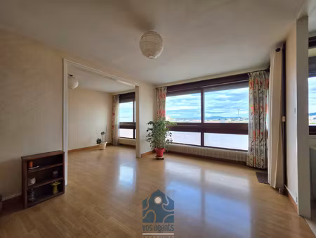 appartement 4 pièces avec balcon  cave et stationnement couv