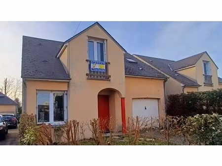 maison individuelle avec jardin et garage