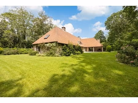 exclusieve villa met gelijkvloerse master suite  prachtige tuin en uitzonderlijk wooncomfo
