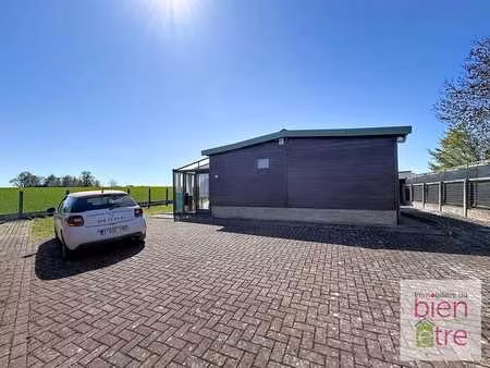 châlet en bois plein sud avec vue sur les champs