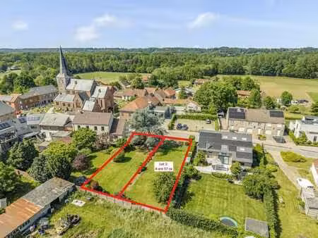 zuid-gerichte bouwgrond voor half-open bebouwing !