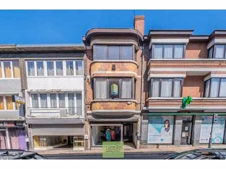 immeuble divisé - commerce + 1 triplex
