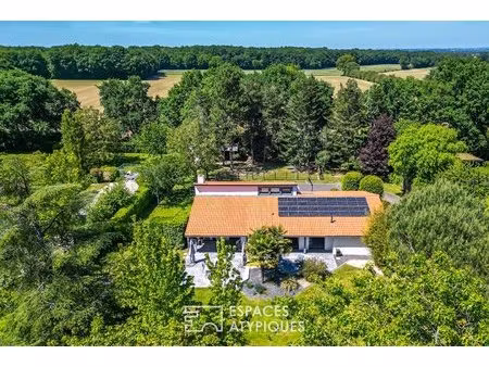 maison familiale dans un écrin de verdure
