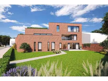 nouveau projet de construction à genk avec 3 maisons et 5 ap