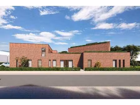nouveau projet de construction à genk avec 3 maisons et 5 ap