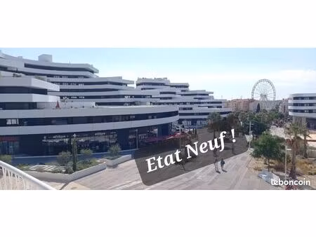 superbe appartement neuf - centre port - proche du village naturiste - vue mer
