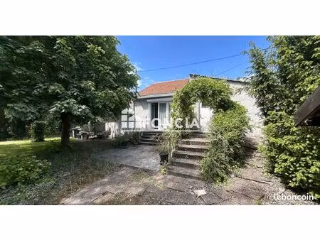 maison individuelle de 50 6 m2  à rénover  avec jardin d'environ 350m2