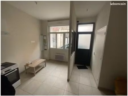 maison mitoyenne dans le centre proche des commerces