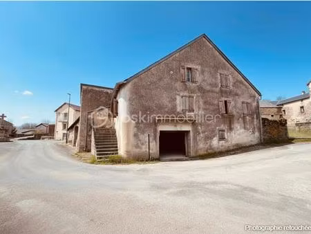 exclusivite - maison de village à rénover avec grand garage