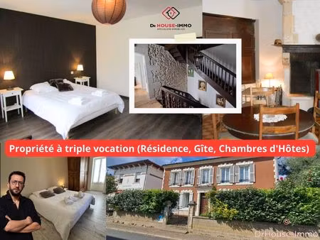 bâtisse de 365 m² avec chambres d'hôte et un gîte attenant.