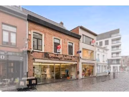 à vendre: commerce au centre de boom