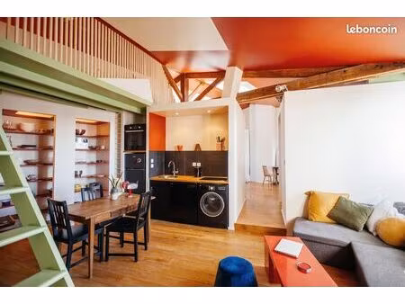 loft avec vue sur les toits de paris