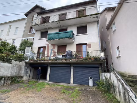 investissement : immeuble a tulle avec garages et balcons