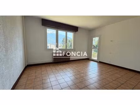 appartement t3 avec balcon  cave et parking copropriété