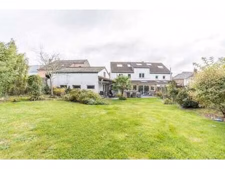 maison 4ch peb b avec jardin dans un quartier calme