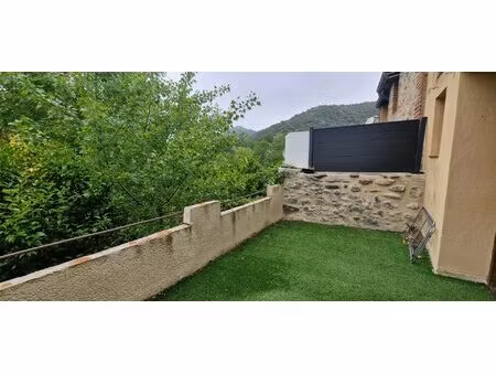 rodes - maison de village avec garage et terrasse