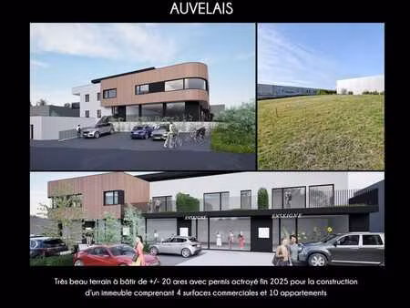 terrain avec permis octroyé pour 4 surfaces commerciales et