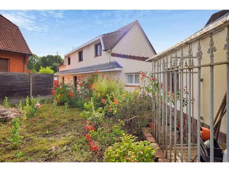 maison familiale 110m² -4 chambres semi plain-pied -garage et jardin