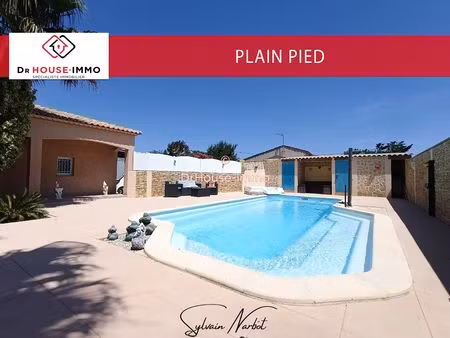 maison de plain-pied  piscine  sur grand terrain de 900 m2