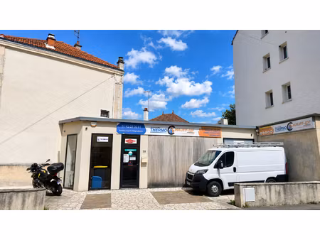 local commercial de 58 m²  proche centre-ville et rer a
