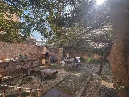 studio + terrasse + jardin commun + cave