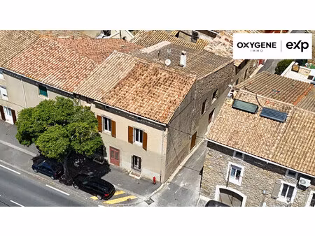 à vendre – bâtisse de caractère en pierre au coeur des corb