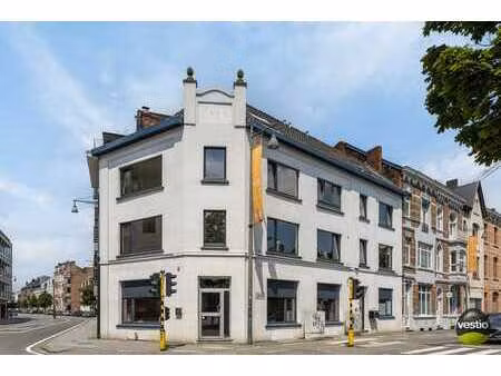 opbrengstgebouw met 8 studentenkamers en gelijkvloerse ha...