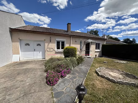 maison de plain-pied avec garage  cave et terrain attenant