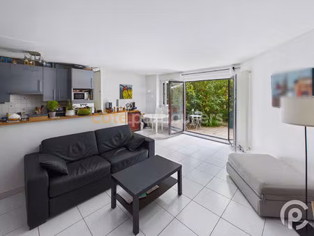 t3 duplex rez-de-jardin en coeur de ville