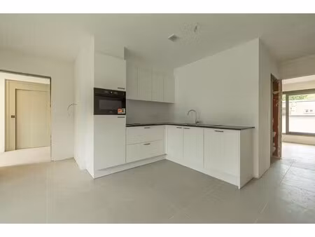 gelijkvloers éénslaapkamer appartement met tuintje