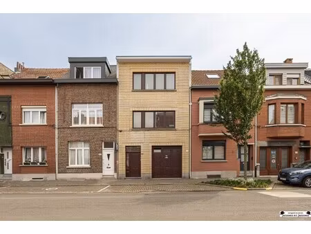 te renoveren woning met 6à8 slaapkamers  garage en tuin!