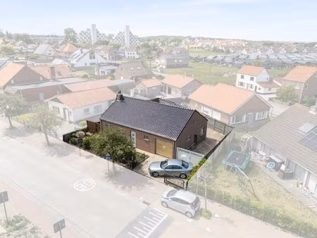 instapklare gelijkvloerse villa te koop in hartje vosseslag - de haan!