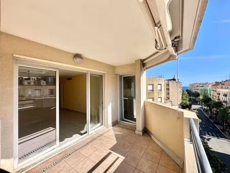 appartement 3 pièces - balcon - 71m2 - carré d'or