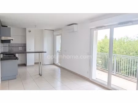appartement t3 lumineux avec balcon vue dégagée et 2 places de parking dans résidence sécu