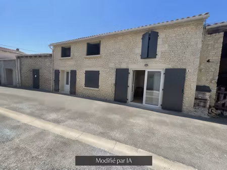 maison en pierre avec chai attenant et jardin