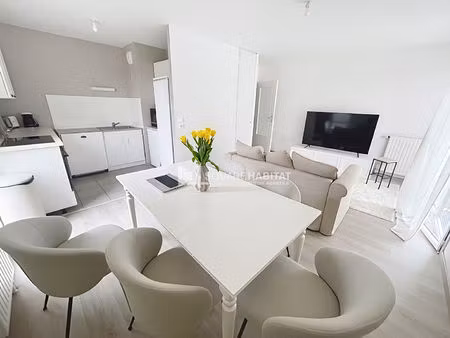 vezin joli type 3 d'environ 65 m² avec balcon   2 stationnements en sous sol