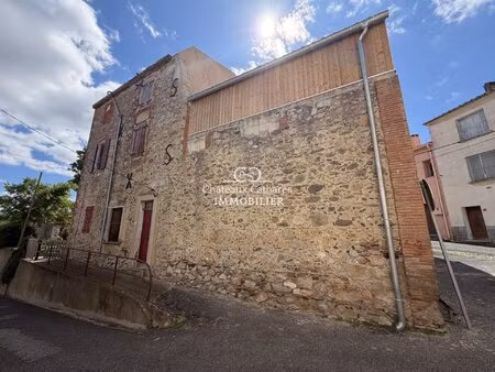 grande bâtisse avec fort potentiel