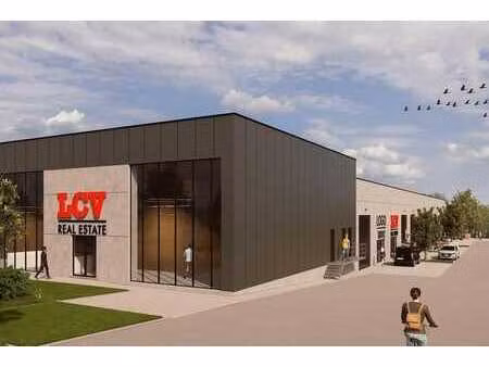 toonzaal 450m² met magazijnruimte van 283m² in ronse