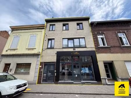 immeuble 3 appartements + 1 commerce