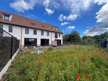 maison neuve vendue en état casco  située dans le quartier r