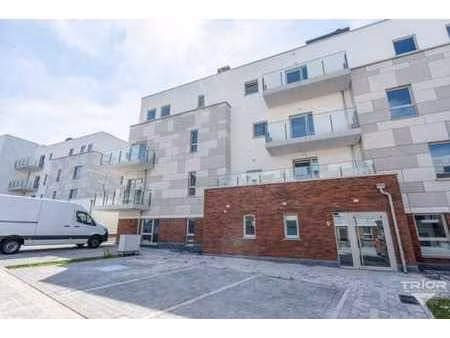 appartement neuf 1ch + parking - centre de nivelles